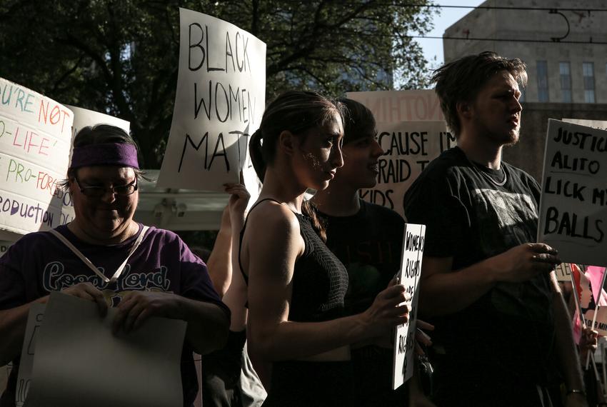 Demonstrators gather in front of the Federal Courthouse to listen to speakers during a protest hours after the Supreme Court ruled to overturn Roe v. Wade on Friday, June 24, 2022, in Houston, Texas.